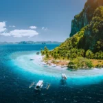 Pinagbuyutan Island in El Nido, highlighting a tropical Palawan Philippines vacation with turquoise waters.