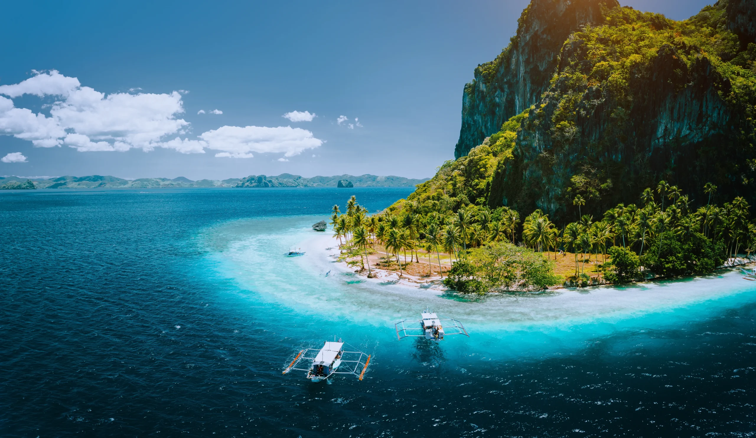 Pinagbuyutan Island in El Nido, highlighting a tropical Palawan Philippines vacation with turquoise waters.